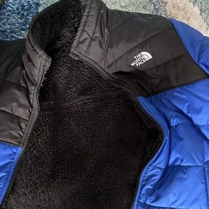 Blue and Black fluffy North Face puffer